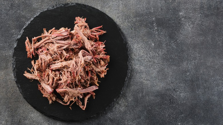 pulled pork on stone slab