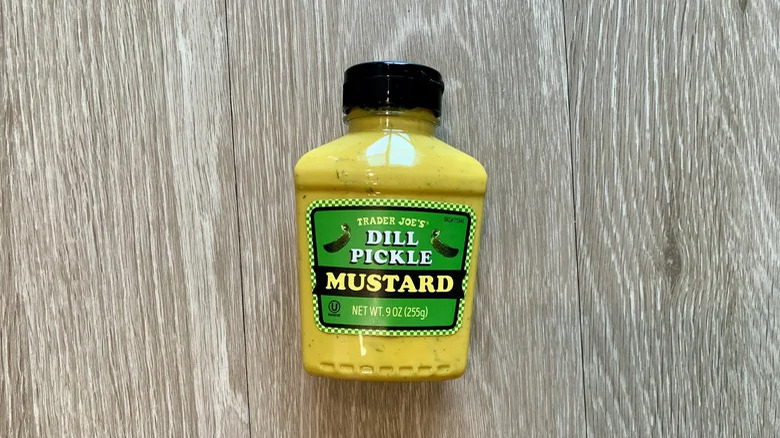 Dill pickle mustard on wood