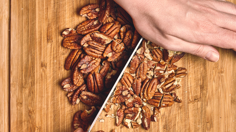 Pecans on a chopping board