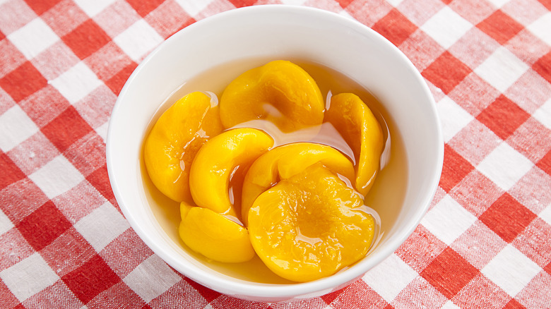 Canned peaches in a bowl