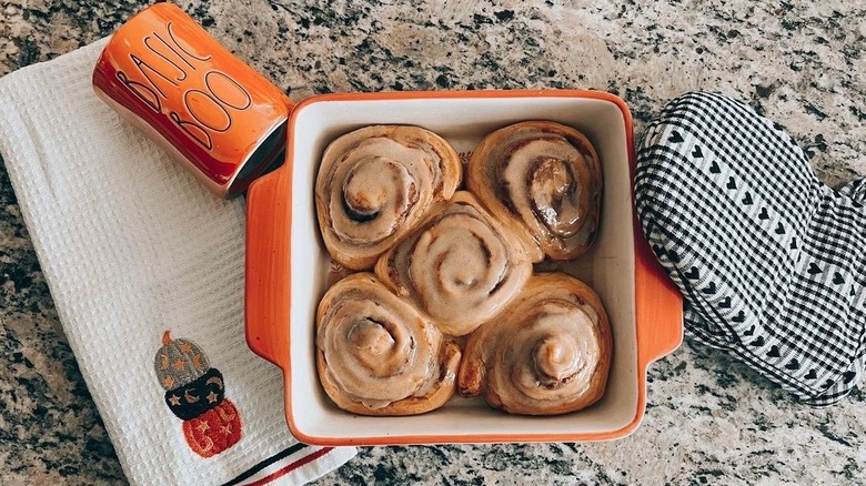 Pumpkin cinnamon rolls in baking pan