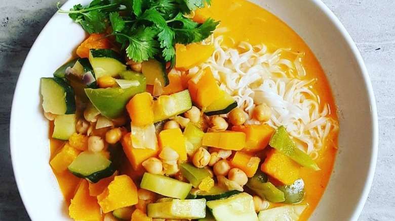 Pumpkin curry in white bowl