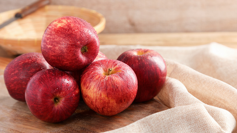 apples on wooden table