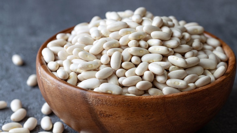 navy beans in a wooden bowl