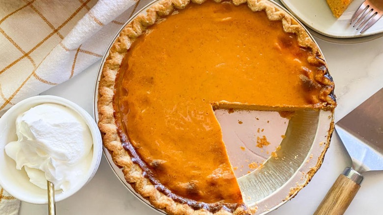 pumpkin pie with missing slice