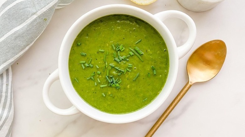 Spinach soup in white bowl