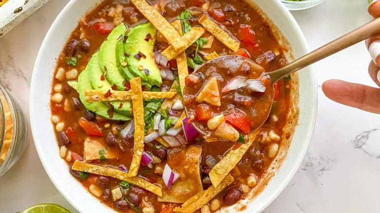 Bowl of vegetarian tortilla soup 