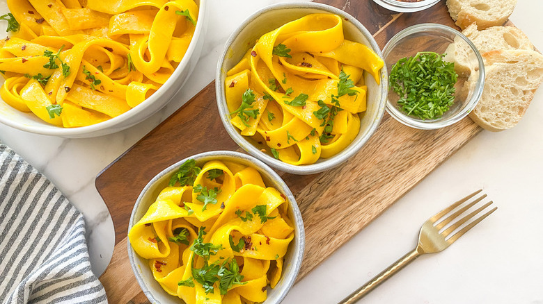 butter noodles in small bowls