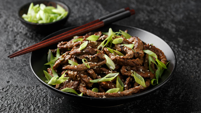 beef bulgogi with scallions and sesame seeds 