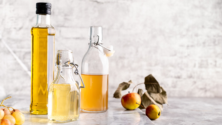 three glass jars of rice wine vinegar