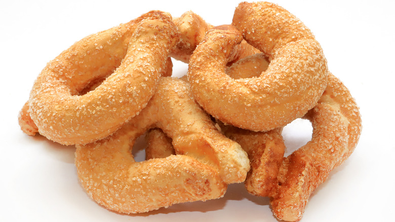 Torcetti biscuits on white background