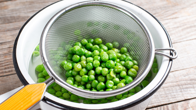 Green peas in a colander