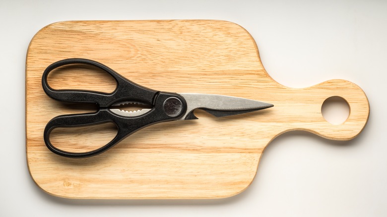 Kitchen shears on board