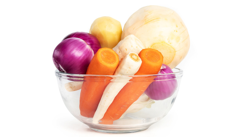 Peeled vegetables in glass bowl