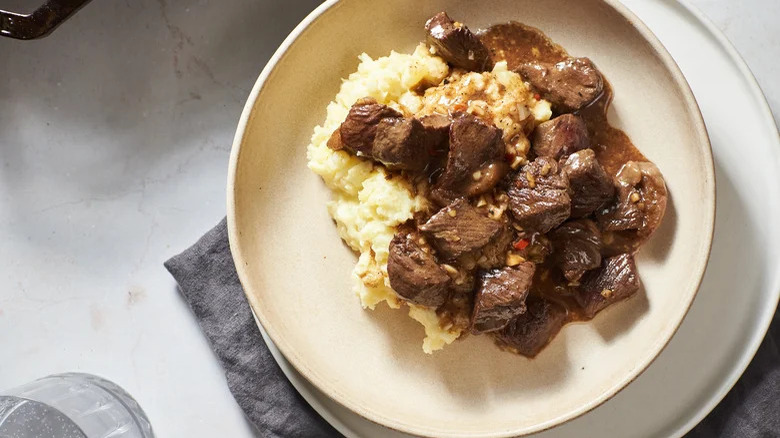 Beef tips with mashed potatoes