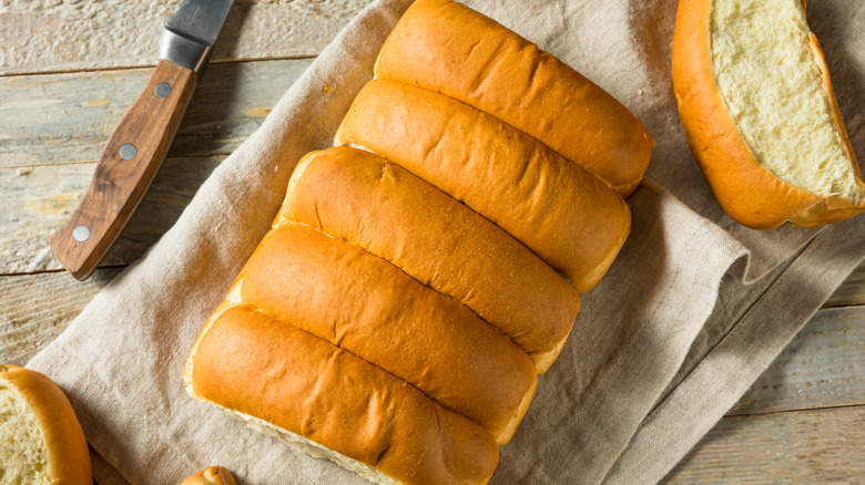 Hot dog rolls on towel