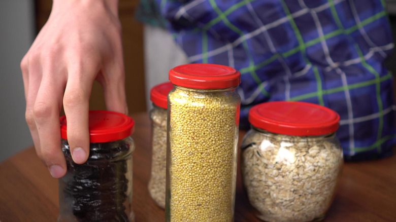 Repurposed glass jars in pantry