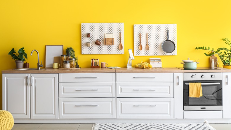 Peg board over kitchen counter