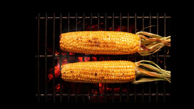 Grilled corn over hot coals