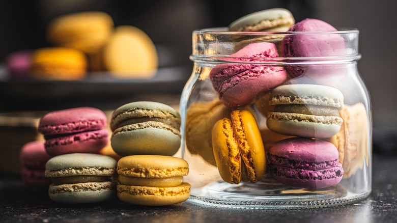 Colorful French macarons in jar