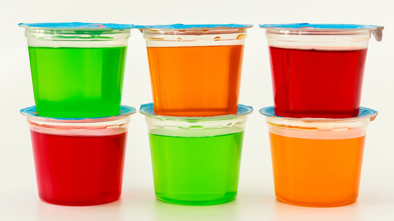Cups of Jell-O on white surface