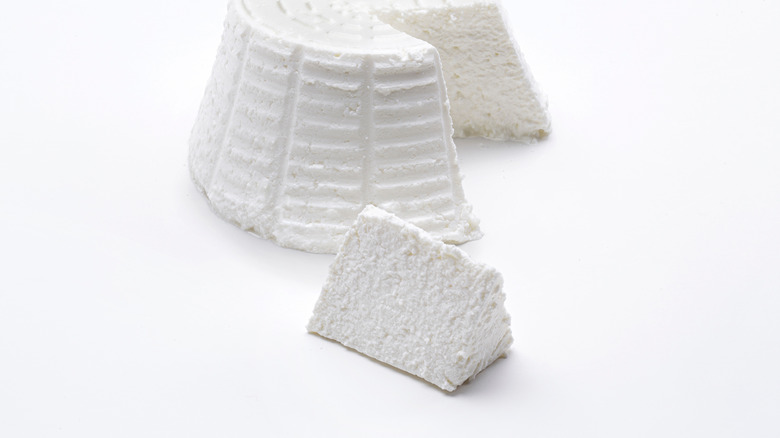 Ricotta cheese on white background