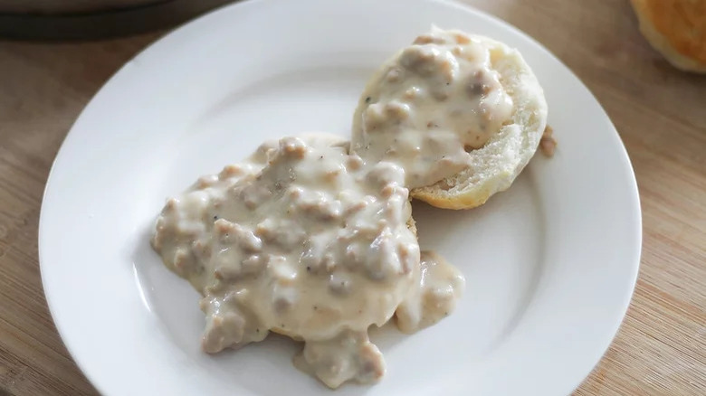 Sausage gravy over biscuits