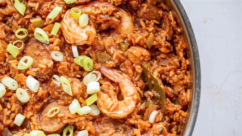 Jambalaya in dish with scallions