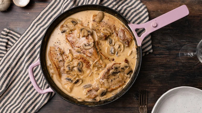 Pork chops sauce in skillet