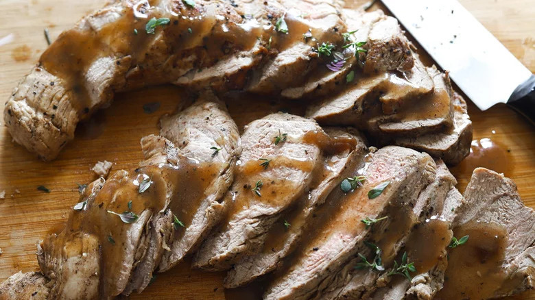 Pork tenderloin on cutting board