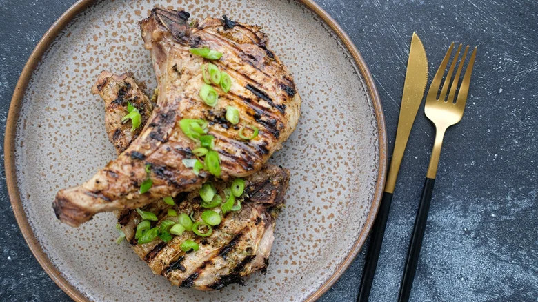 Jerk pork chop on plate