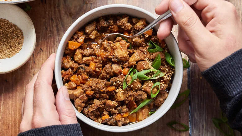 Bowl with chili and spoon 