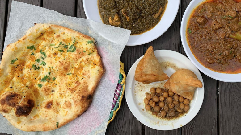 curry with samosas and naan