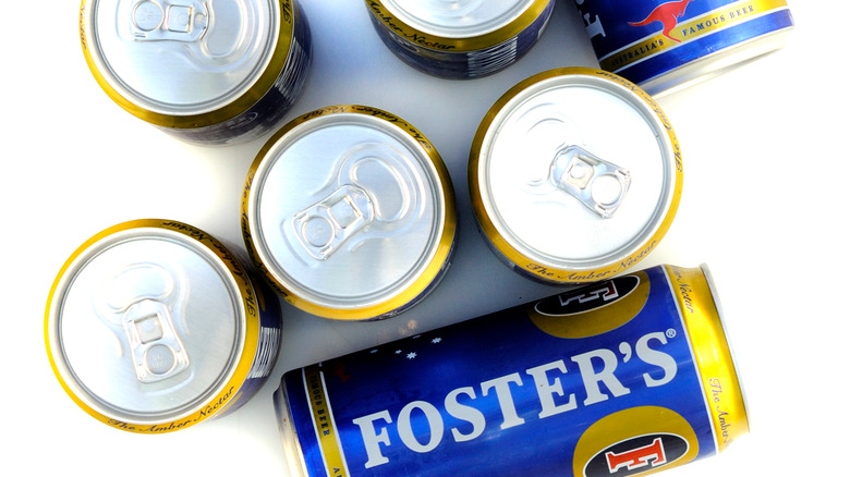 multiple cans of Foster's beer