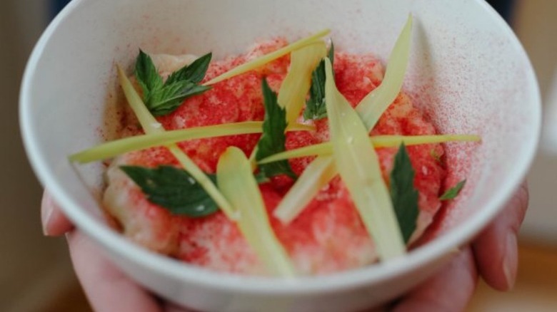 Peninsula seafood dish garnished with herbs