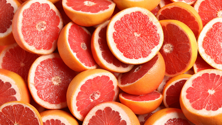 sliced grapefruits ready to be juiced for grapefruit custard pie