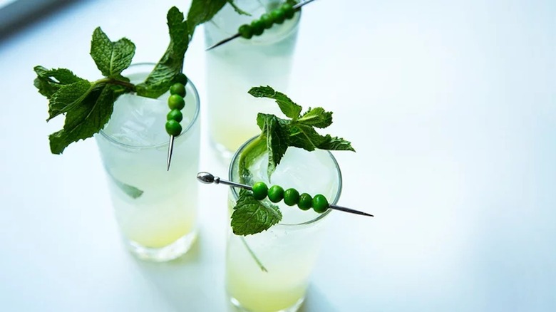 Mojitos with pea garnish