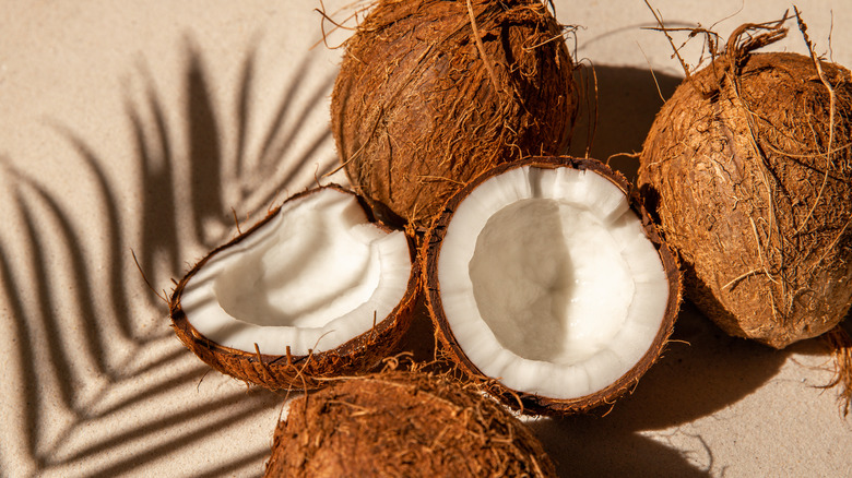 Fresh coconut split in half