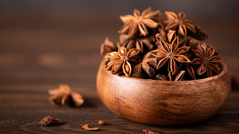 Star anise in wooden bowl