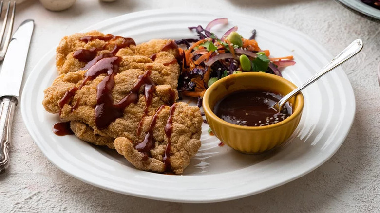 Chicken katsu on white plate