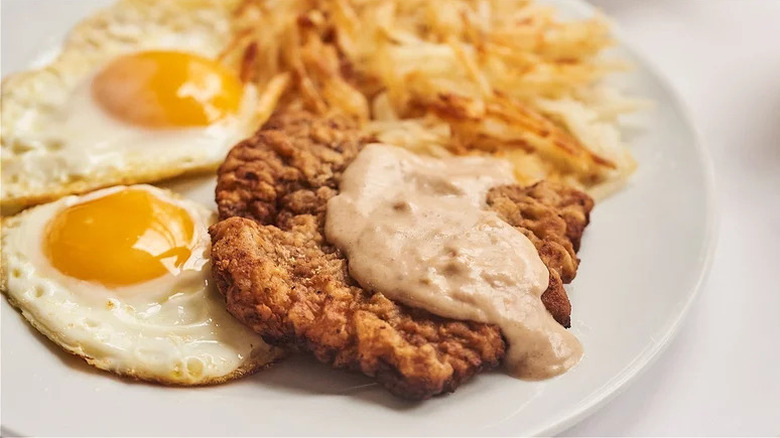 Chicken fried steak with eggs