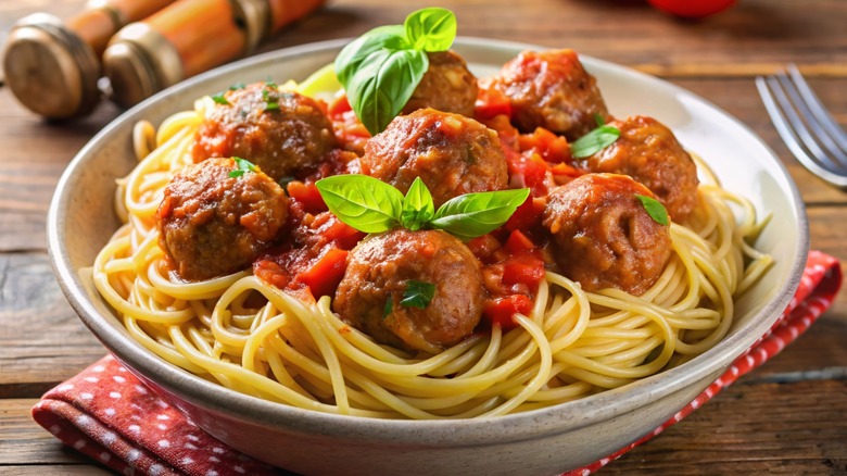 Traditional spaghetti and meatballs in a bowl