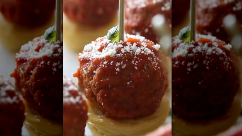 Three plated spaghetti and Italian meatball appetizers