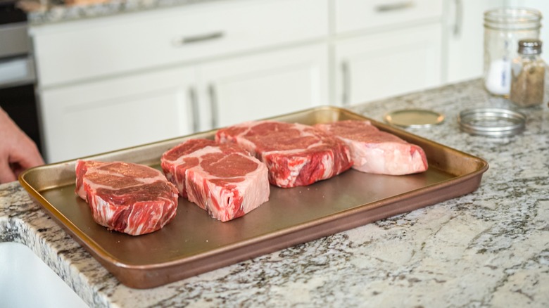 steaks on sheet pan