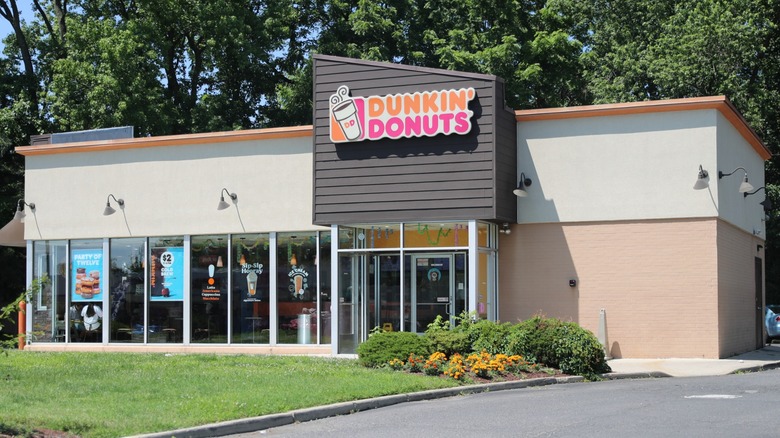 Dunkin' Donuts store with trees in background