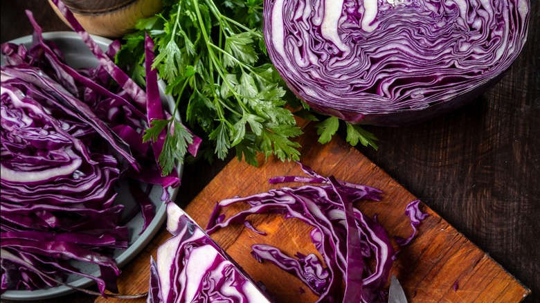 Overview of chopped purple cabbage on a cutting board