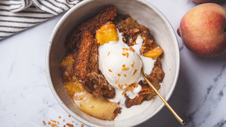 ice cream topped with peaches