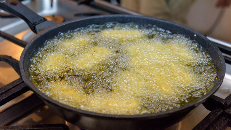 Fish frying in hot oil