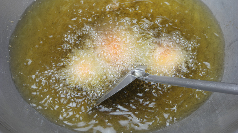 Hot oil in frying pan