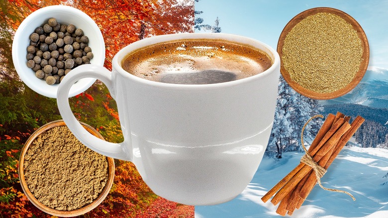 a cup of coffee surrounded by winter spices